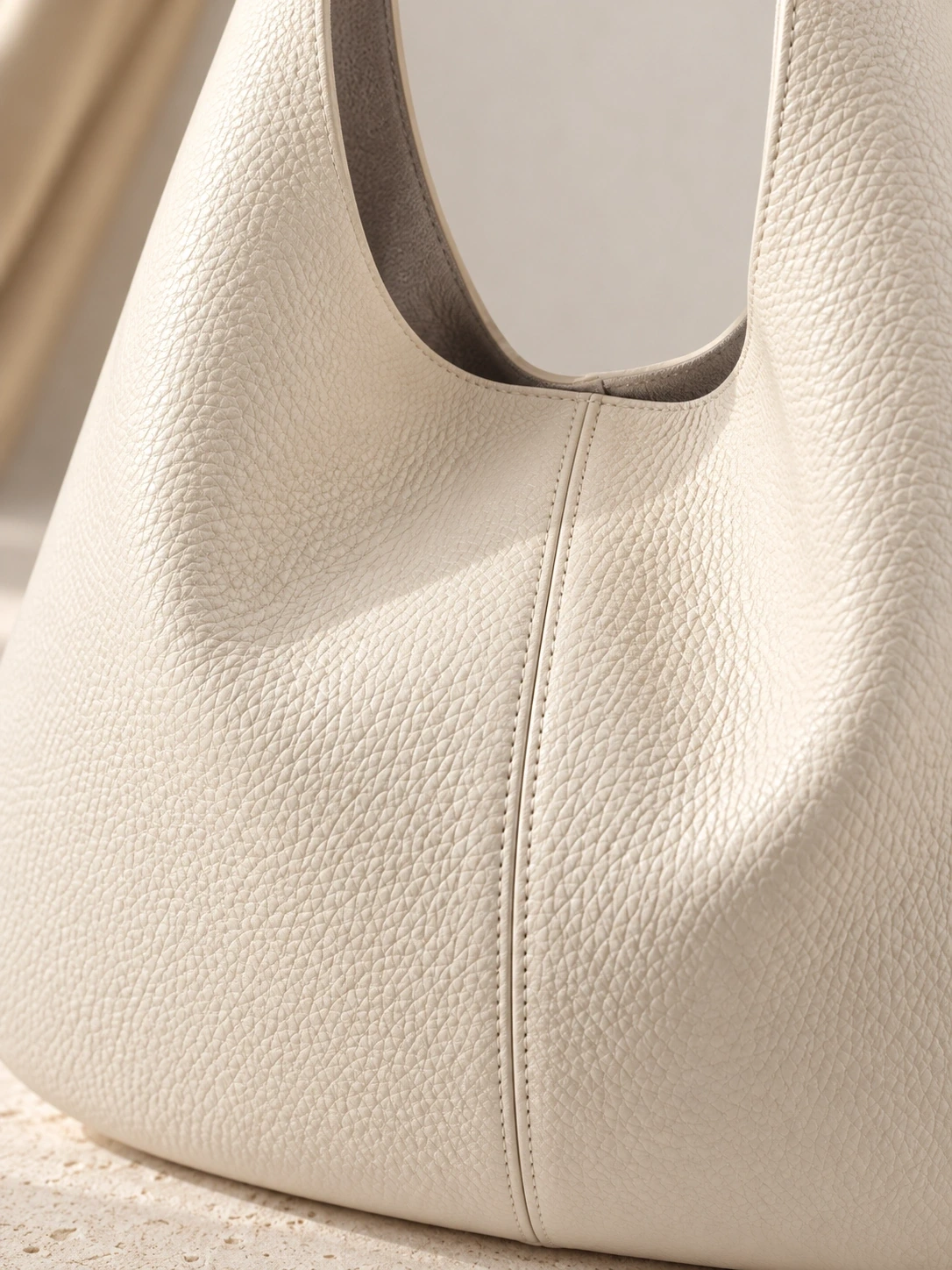 Close-up of pebbled leather and center-front seam