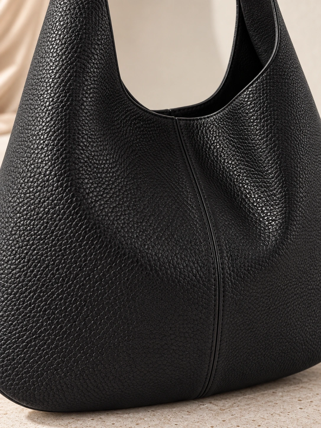 Deep Black pebbled leather grain close-up